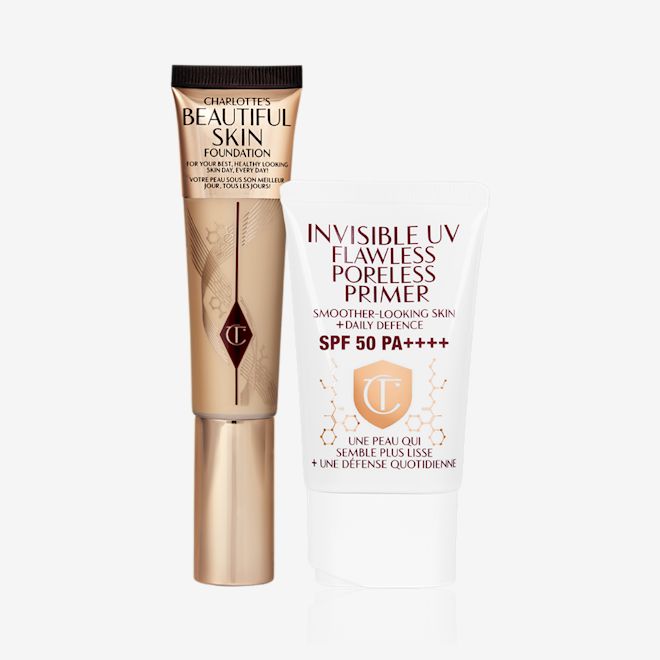 Beautiful Skin Foundation and UV Primer closed Foundation in a light golden-coloured tube with a glowy primer with SPF in a white-coloured tube with a white-coloured lid.
