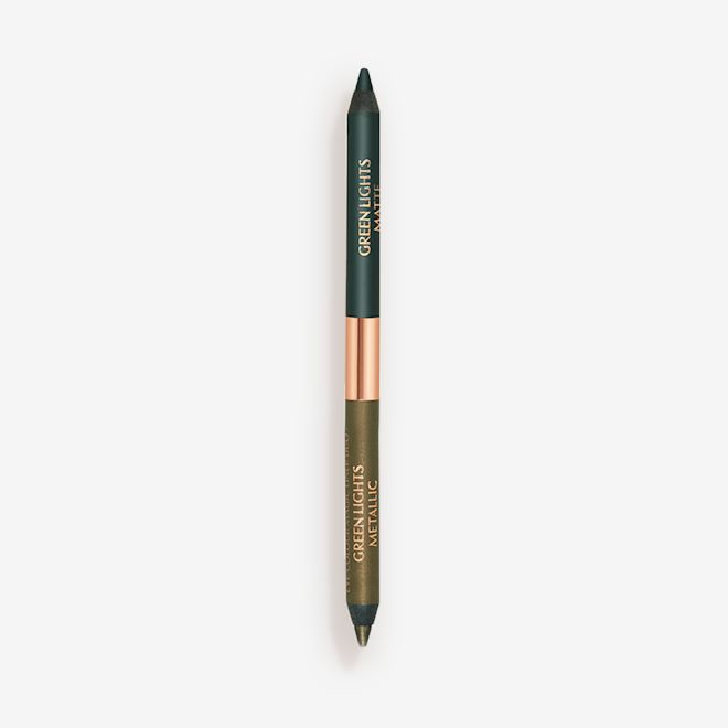 Eye Colour Magic Liner Duo in Green Lights open A double-sided eyeliner with lids removed in bottle green and dark khaki.