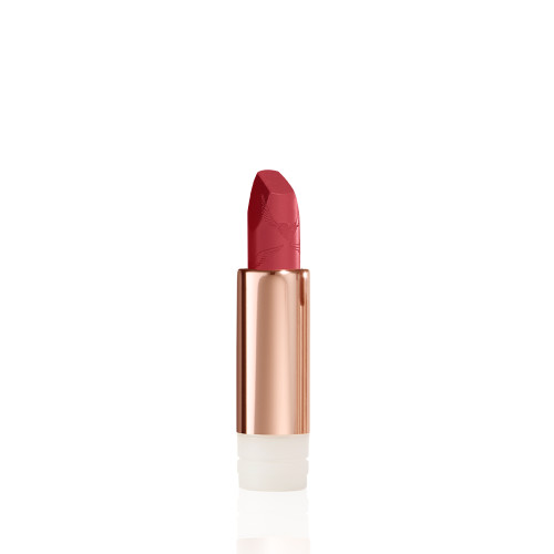 An open, blushed berry-rose lipstick refill in a metallic, golden-coloured tube with its lid next to it. 