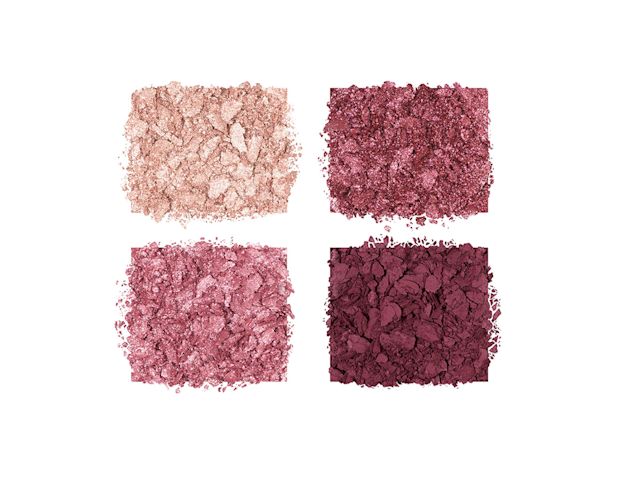 Swatches of four matte and shimmery eye shadows in shades of maroon and champagne.