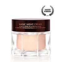 Award-wining, peach-coloured night cream in a large glass jar with a dark brown-coloured lid with Magic Night Cream written on it in gold colour.