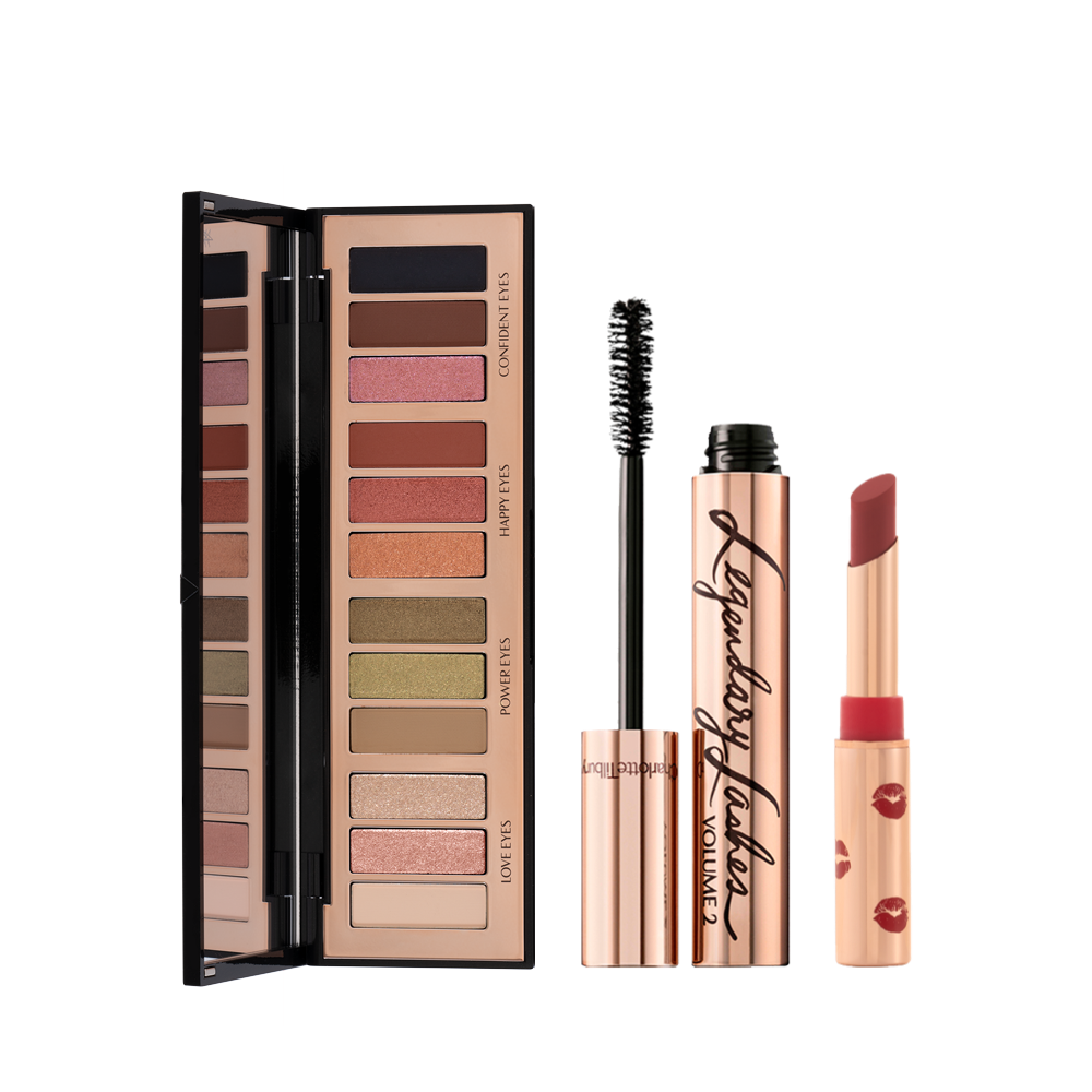 An open, 12-pan eyeshadow palette in matte and shimmery shades beige, pink, silver, green, brown, pink, orange, red, black, black mascara in gold-coloured tube, and maroon lipstick in gold-coloured tube. 