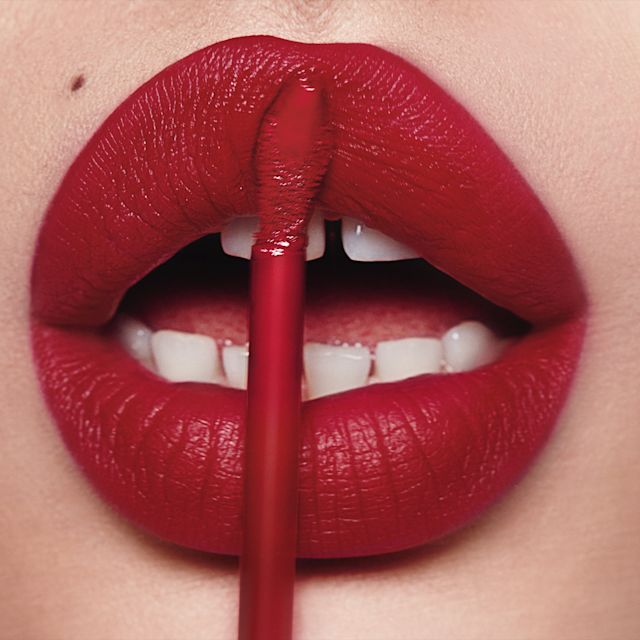 Model close up wearing Airbrush Flawless Lip Blur in Ruby Blur 