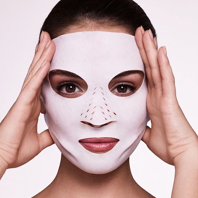 Model wearing Instant Magic Facial Dry Sheet Mask