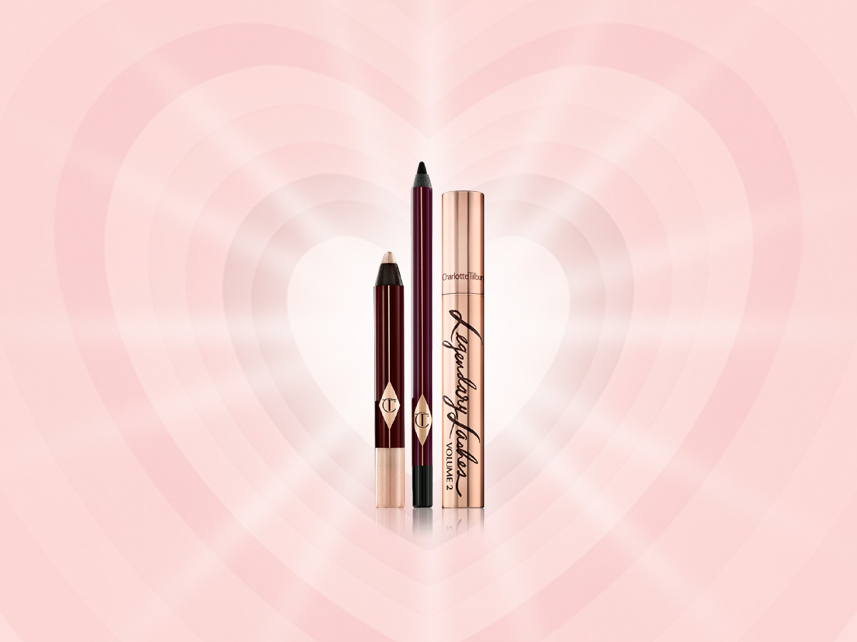 Chubby eyeshadow stick in a shimmery champagne shade, eyeliner pencil in black, and black-coloured mascara in a sleek, gold-coloured tube. 