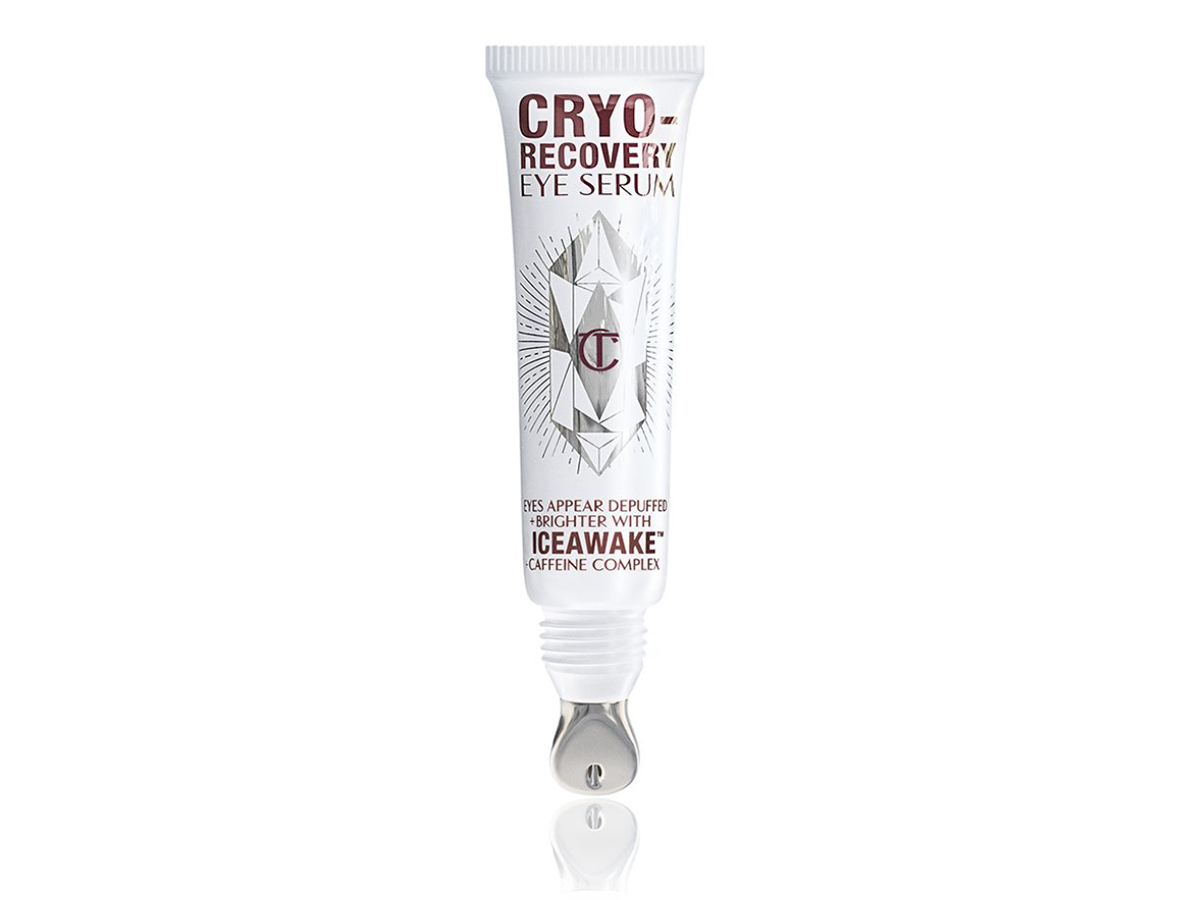 An open, white-coloured eye serum tube with silver-colour geometric patterns on the front and text written on it that reads, 'eye appear depuffed and brighter with Iceawake, caffeine complex'