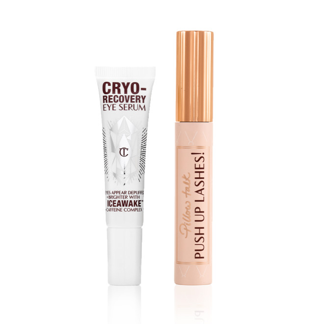 Black mascara in a sheer pink-coloured tube with text on it that reads, 'Pillow Talk Push up lashes!' and a gold-coloured lid with an eye serum in a white-coloured tube.