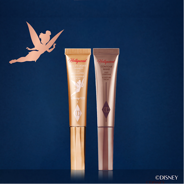 Disney100 x Charlotte Tilbury Beauty Light Wand and Hollywood Contour Wand with Tinkerbell silhouette and night sky backdrop