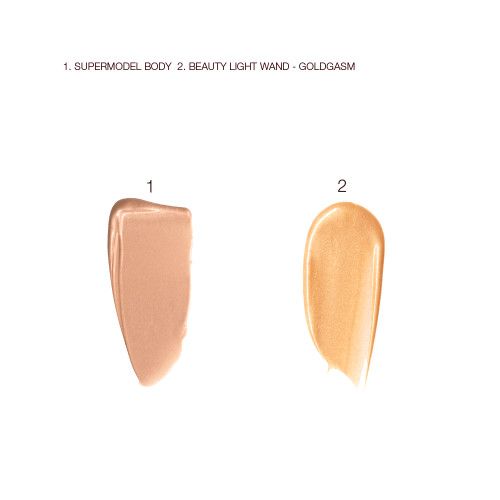 Swatches of liquid body highlighter in a golden beige shade and liquid face highlighter in a honey-gold shade.