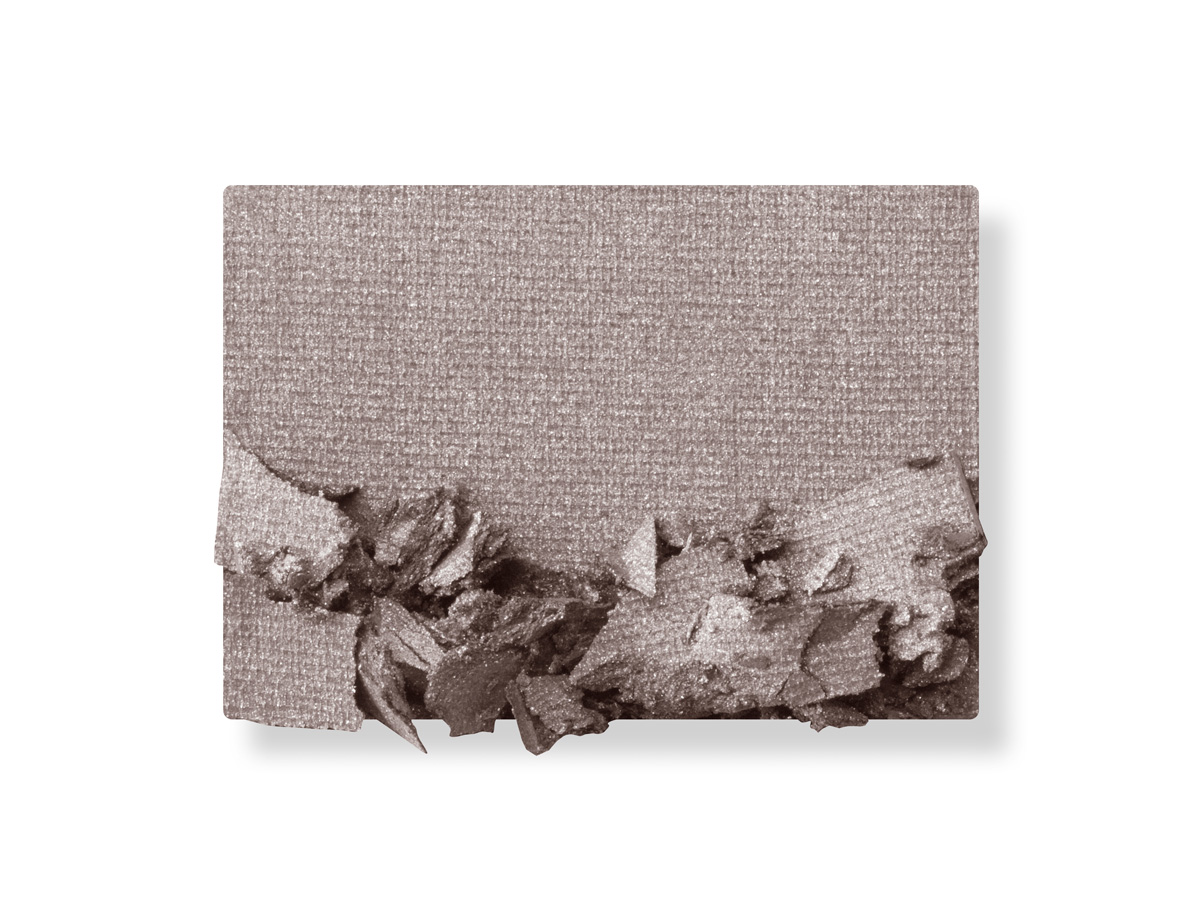 Swatch of a powder eyeshadow in a mid-grey shade. 