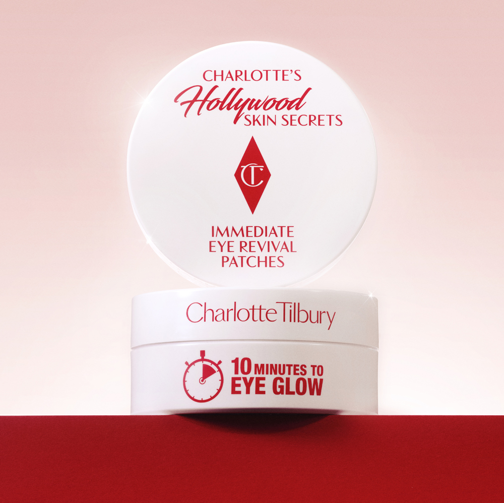 An open jar of Charlotte's Immediate Eye Revival Patches hydrating under eye patches