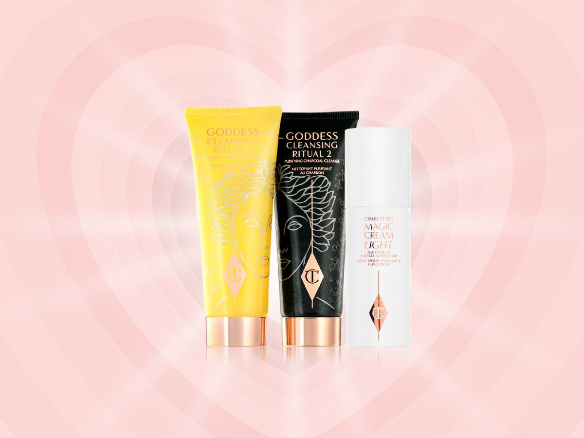 Two facial cleansers, one in lemon-yellow packaging and the other in charcoal-black, with rose-gold coloured lids along with a light face cream in white-coloured packaging.