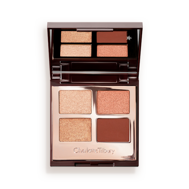 Luxury Palette in Copper Charge eyeshadow open An open, mirrored-lid, quad eyeshadow palette with matte and shimmery eyeshadows in shades of copper and champagne.