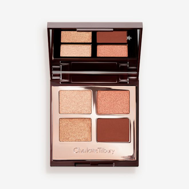 Luxury Palette in Copper Charge eyeshadow open An open, mirrored-lid, quad eyeshadow palette with matte and shimmery eyeshadows in shades of copper and champagne.