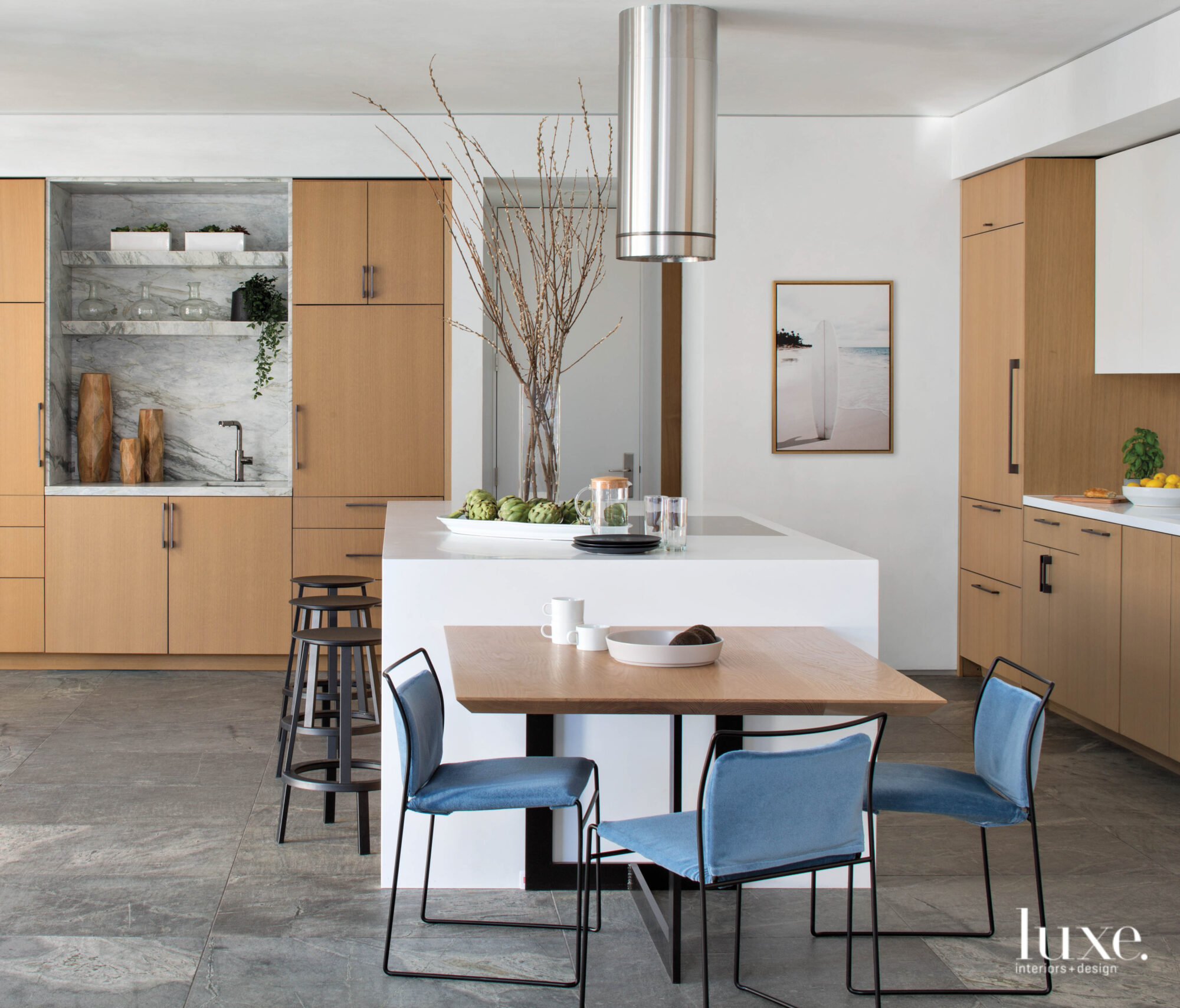 Kitchen island with adjacent seating at table