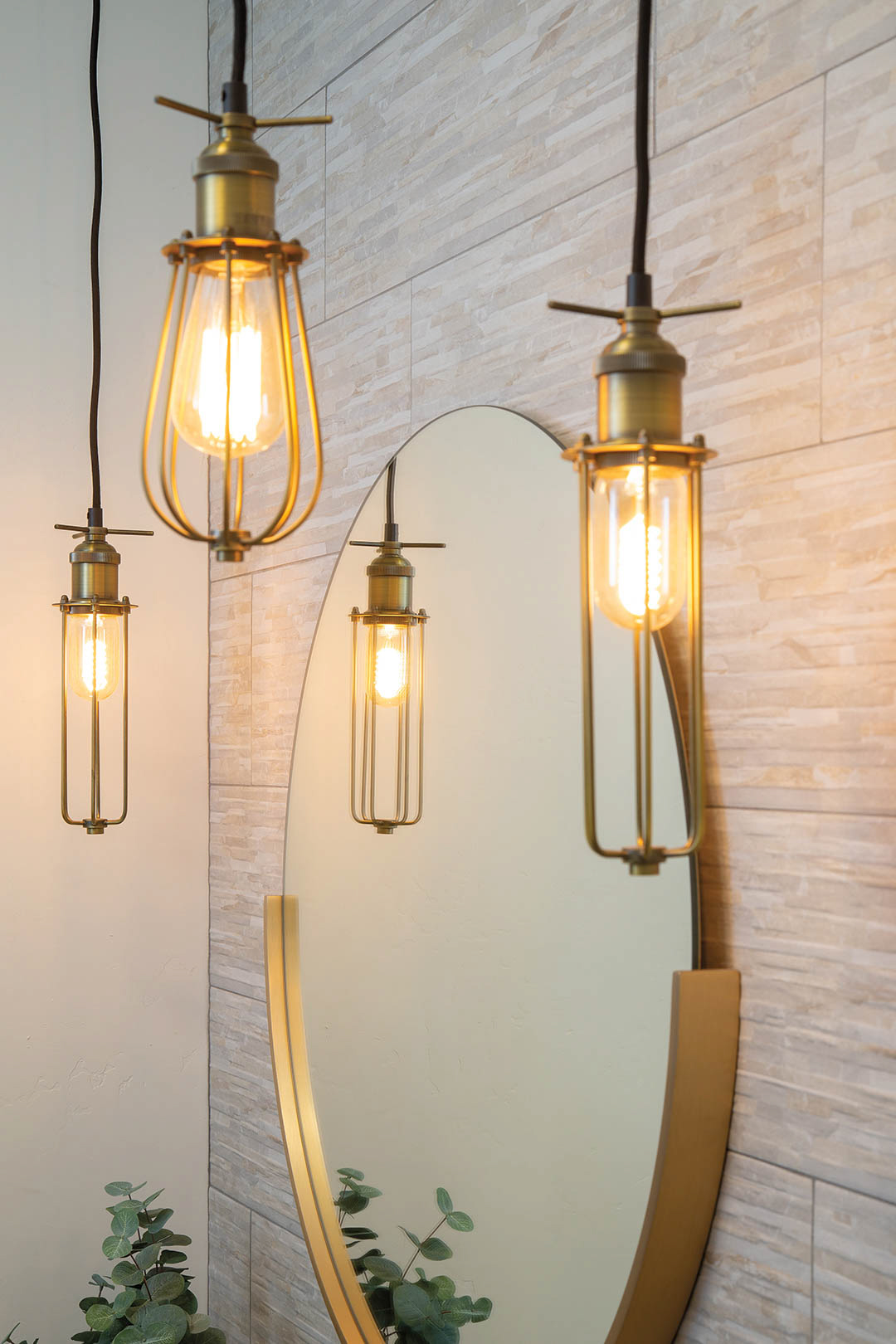 pendants over circular mirror