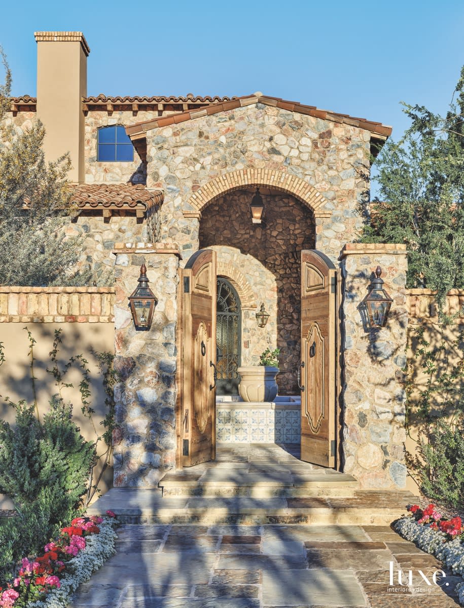 mediterranean exterior neutral entry stonework