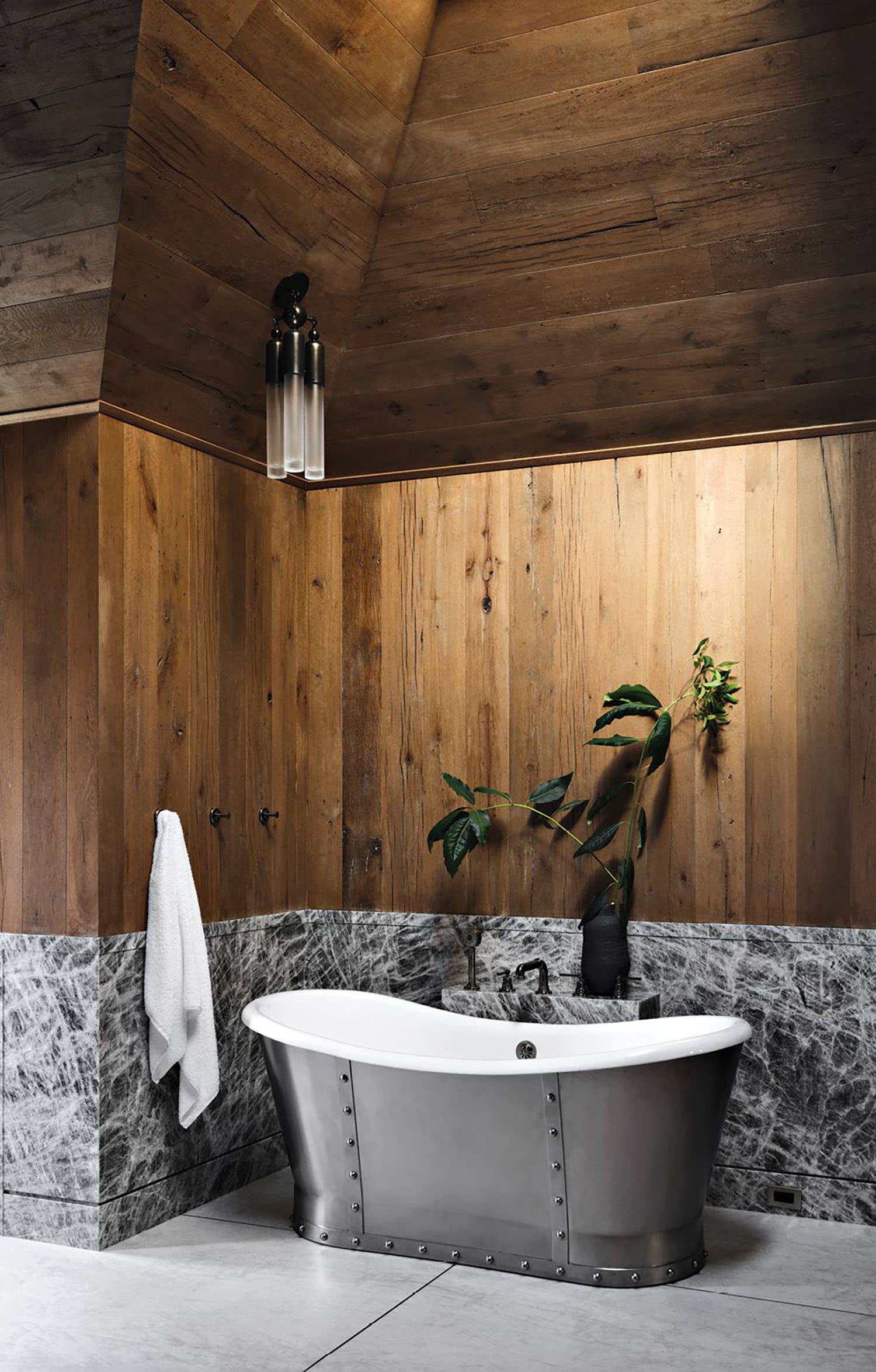 luxury bathroom with wood paneling