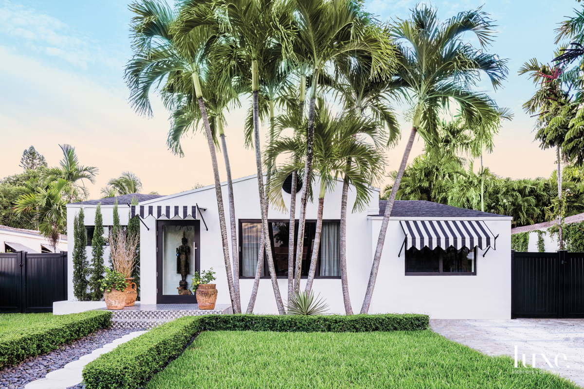 Black and white exterior of midcentury Miami bungalow