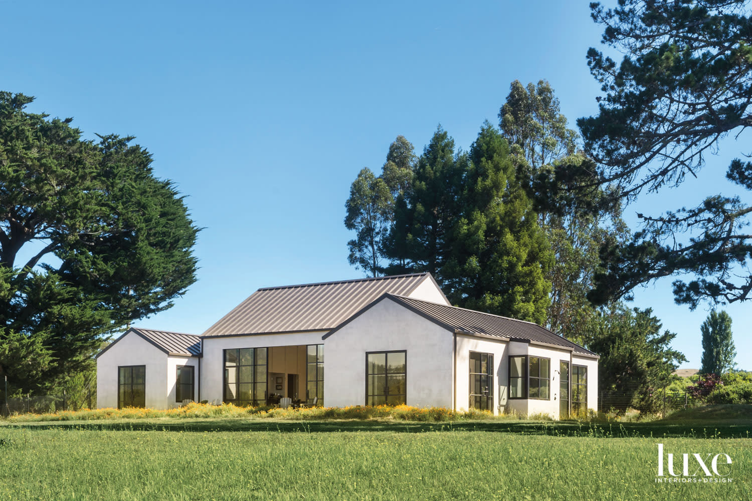 Looking at the house from a distance, you can see its simple lines fit nicely with the landscape.