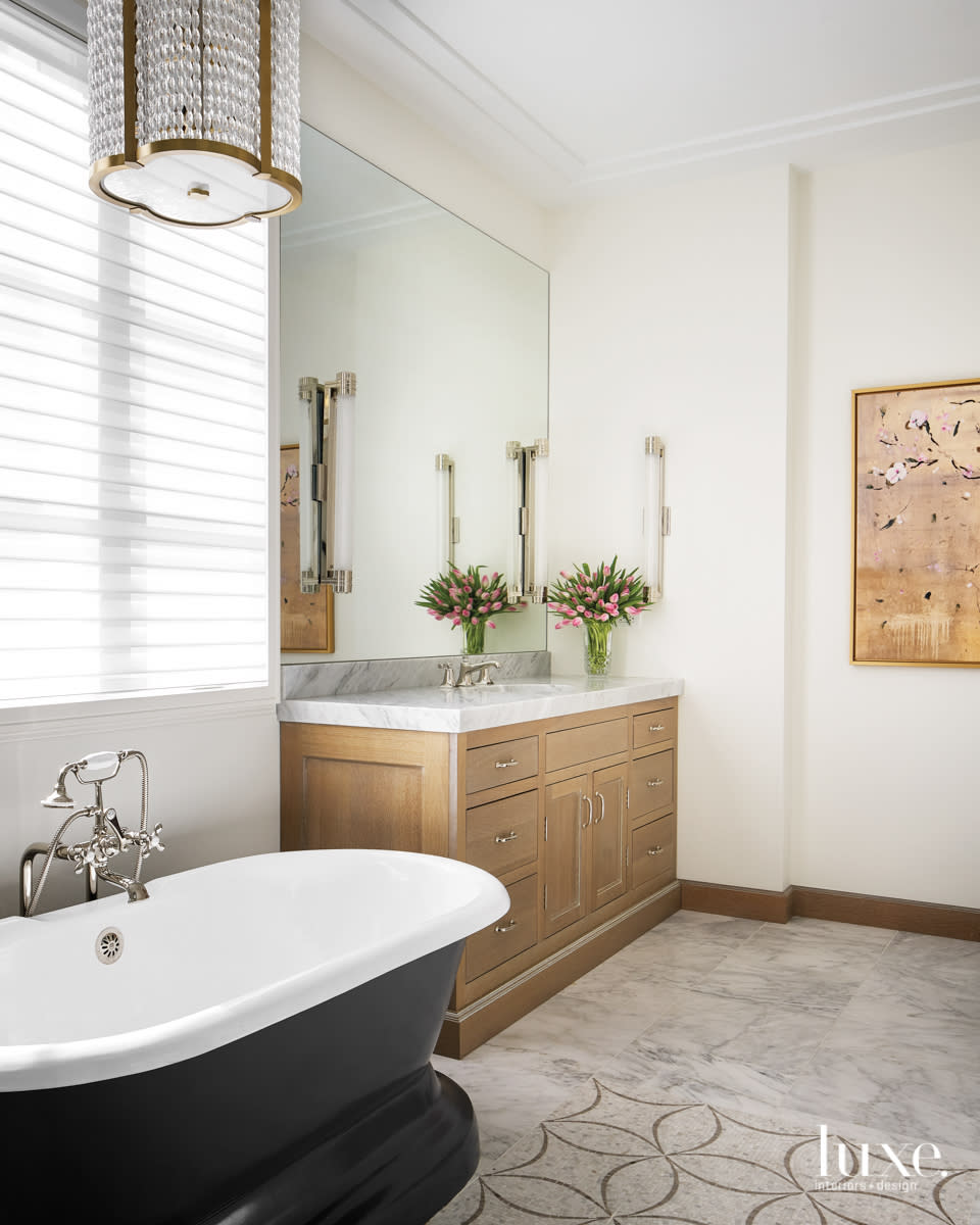 neutral master bedroom with neutral wood finishes