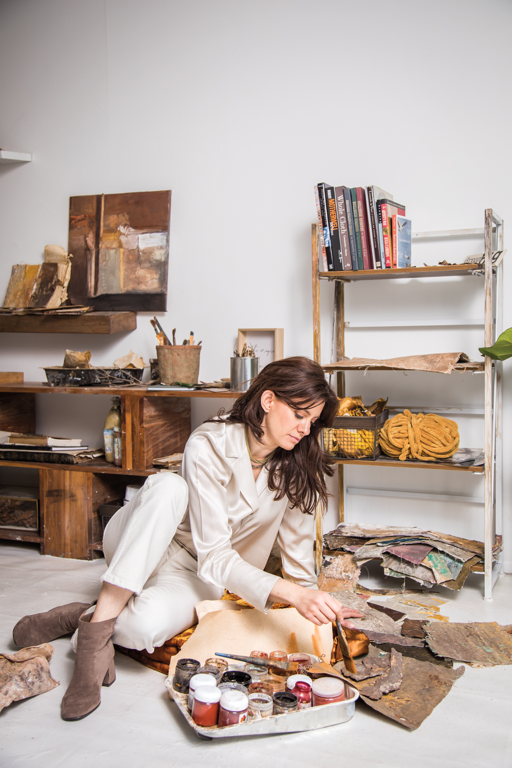 artist Karla Kantorovich creating an artwork in her studio