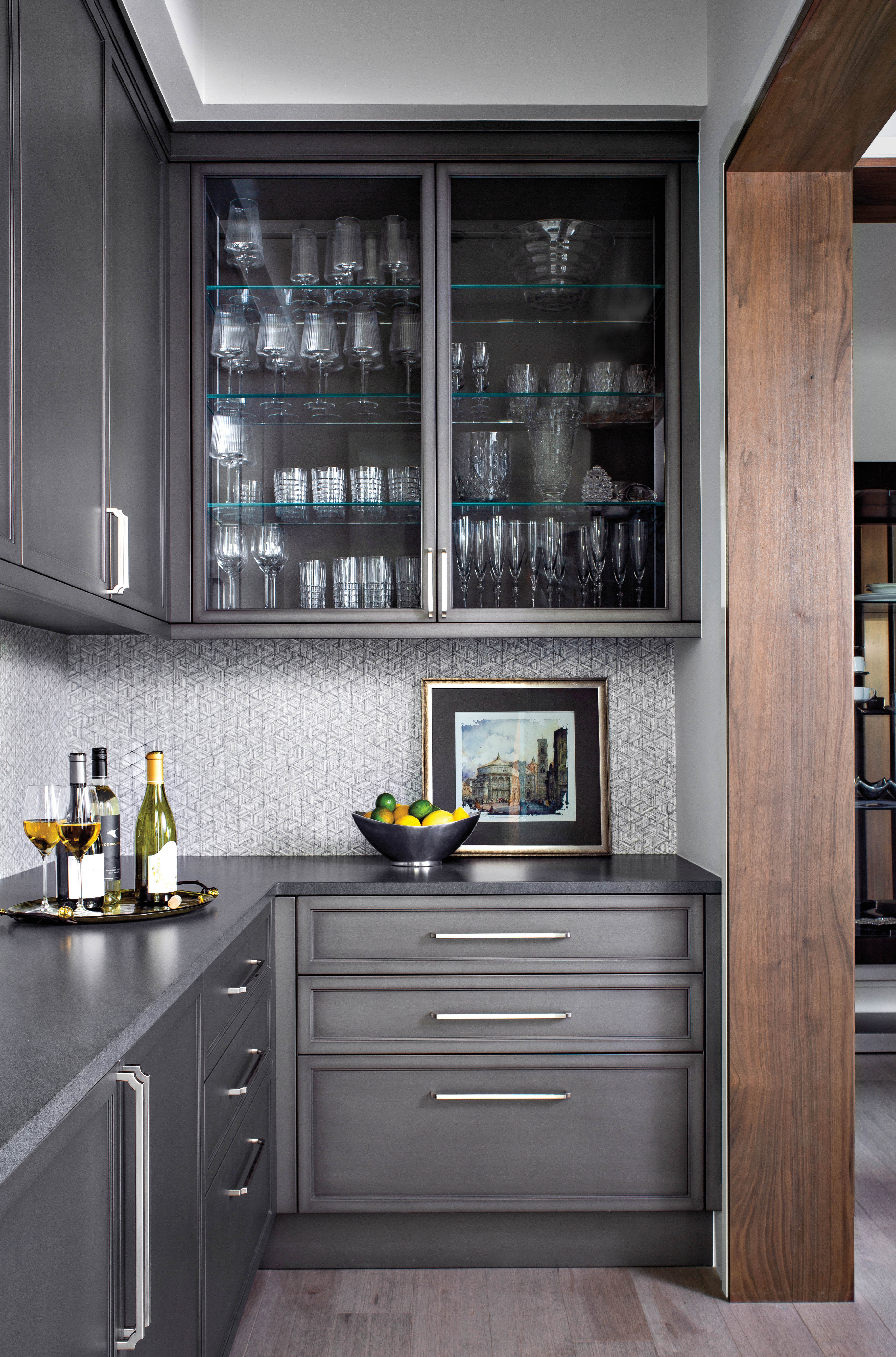 pantry with black cabinetry