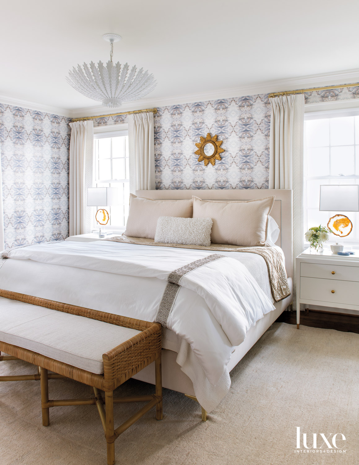 Main zen bedroom with beautiful colors, patterned wallpaper, and neutral furnishings