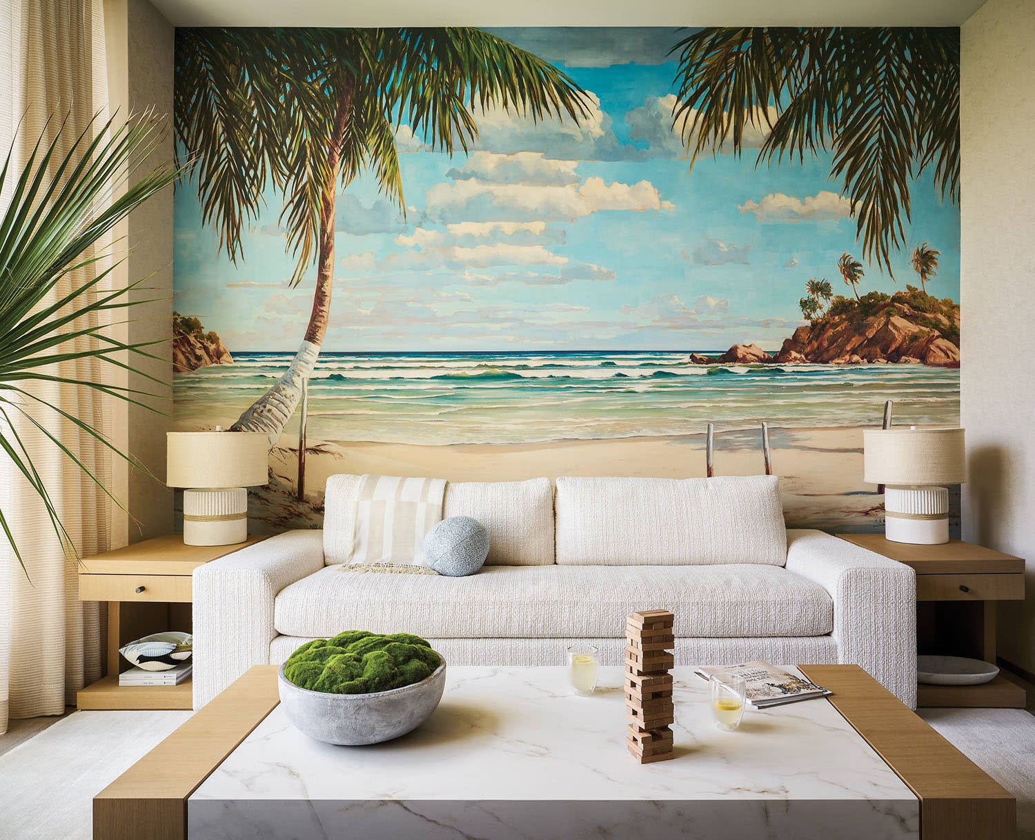 den with a Pierre Frey wallcovering and a boucle sofa