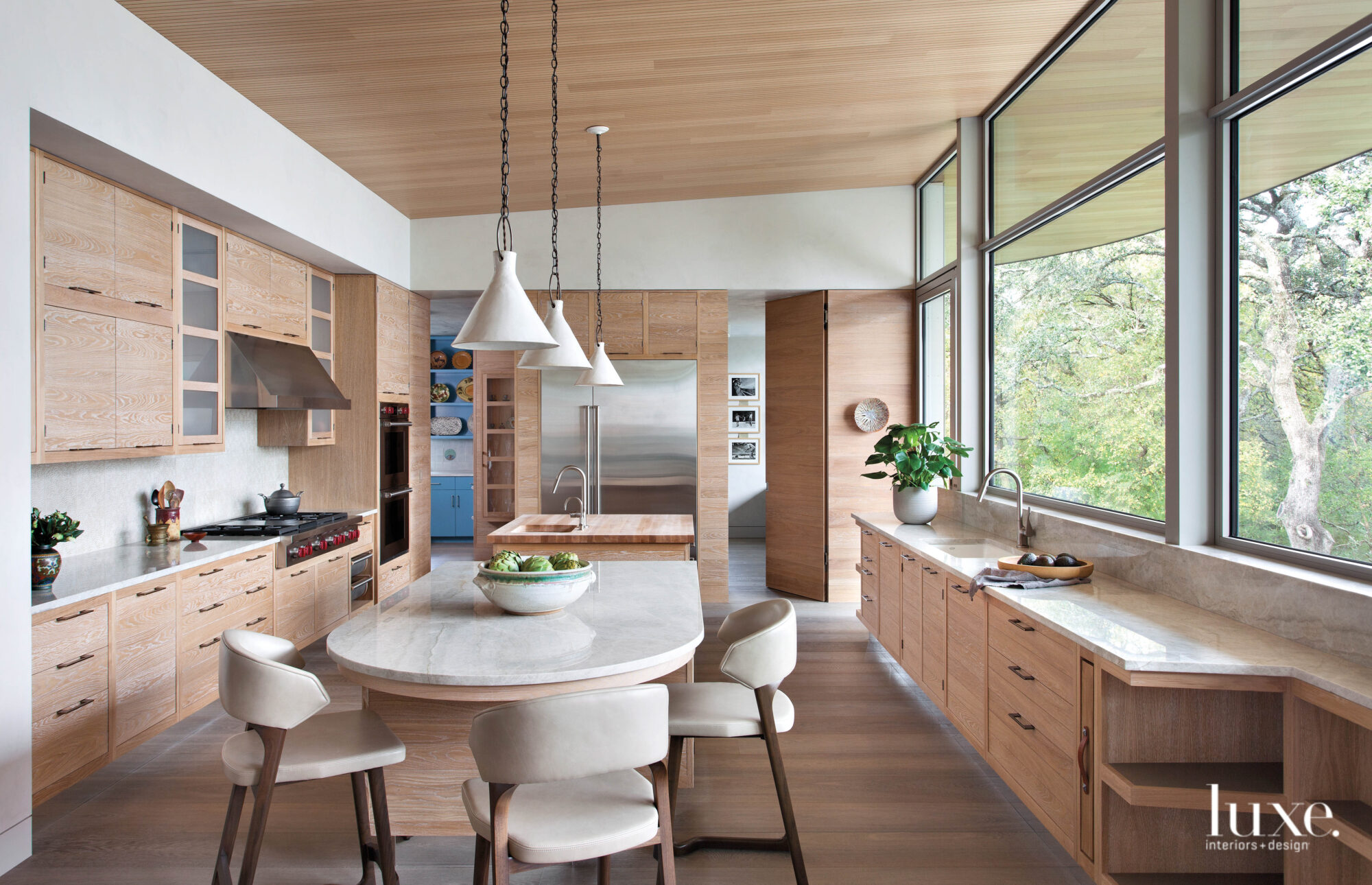 wood kitchen with gray white double islands