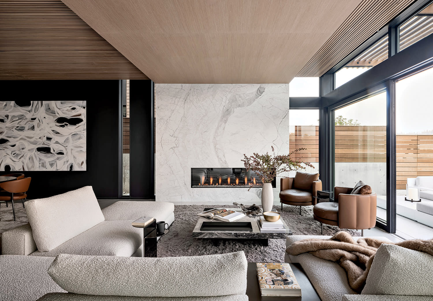 modern living room with a Calacatta marble fireplace
