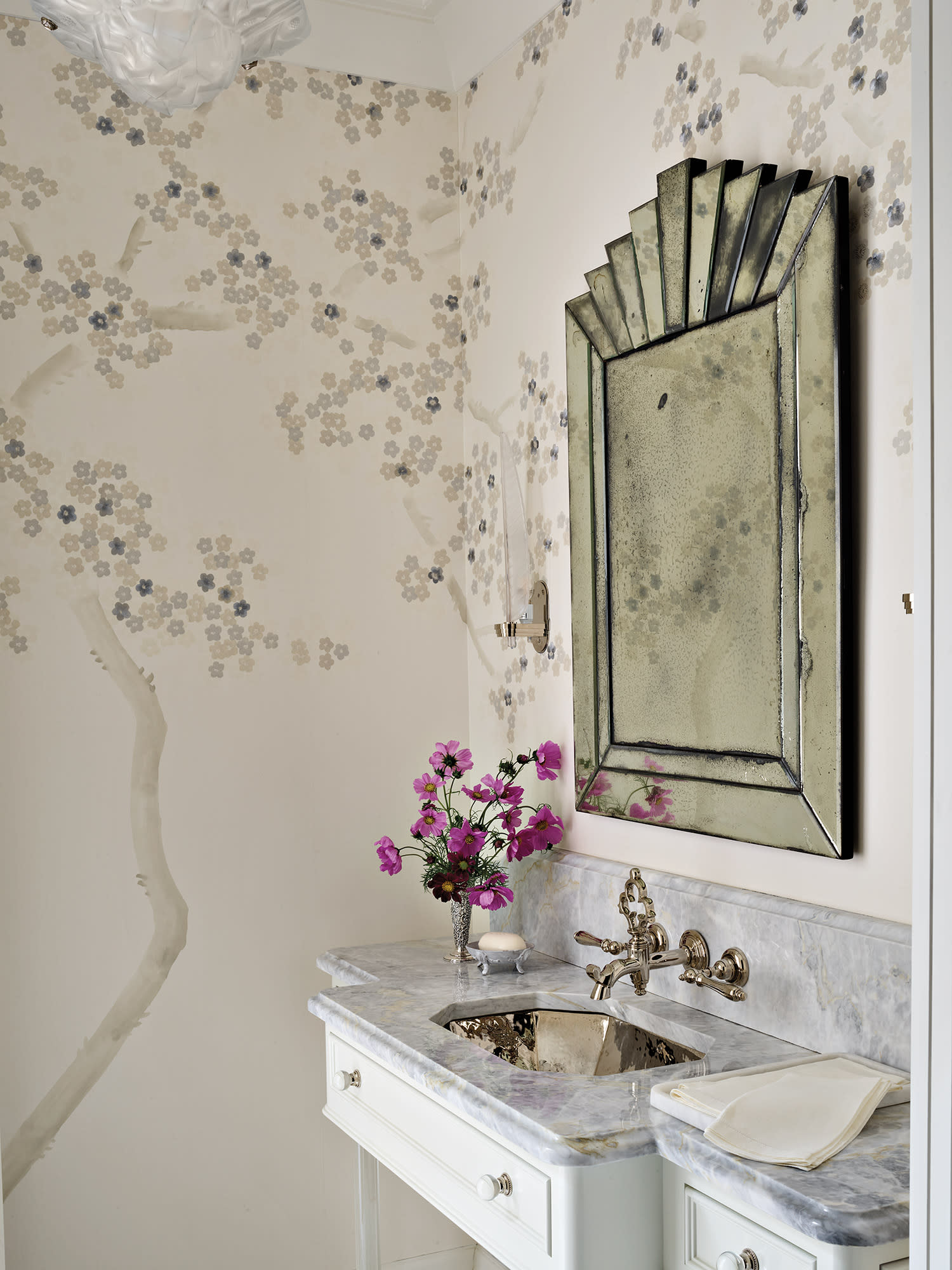 elegant powder room with a hand-painted floral Fromental wallcovering
