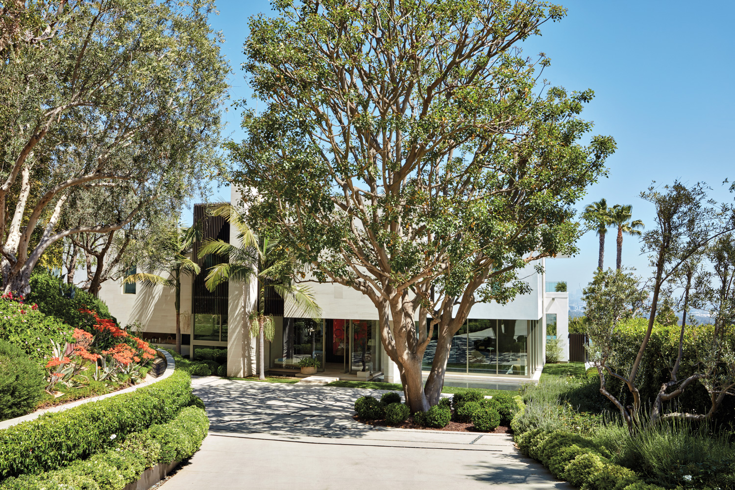 Bel Air home facade with vertical screens and stone-faced walls