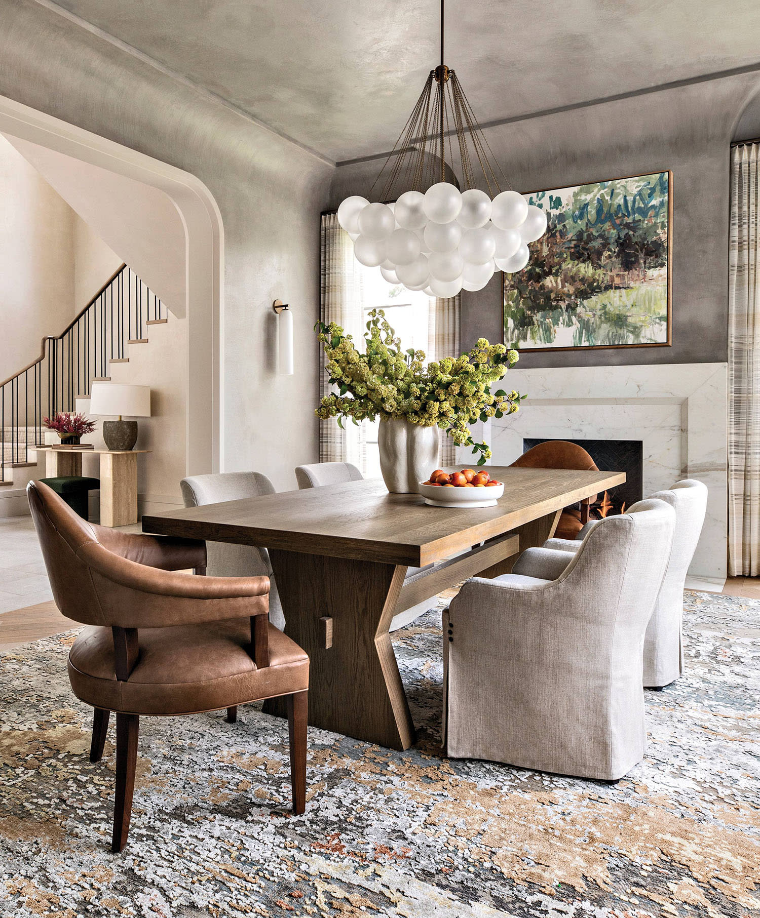 modern dining room with a cloud chandelier