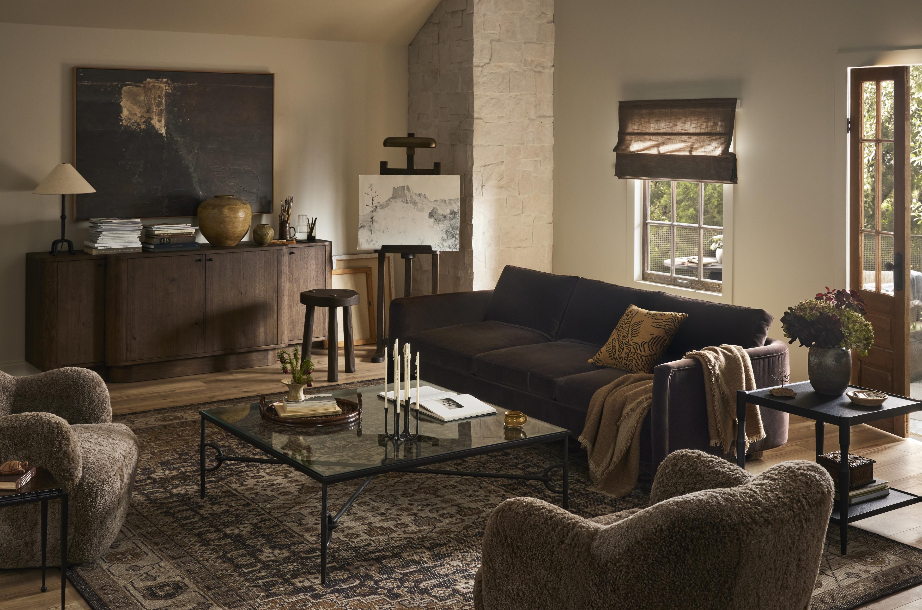 Cozy living room, featuring chocolate velvet sofa, and coordinating sherpa club chairs.