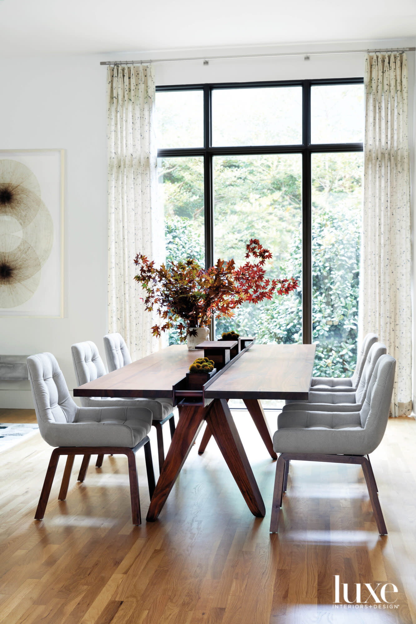 Bar area with a Canal dining table by Patricia Urquiola for Riva 1920.