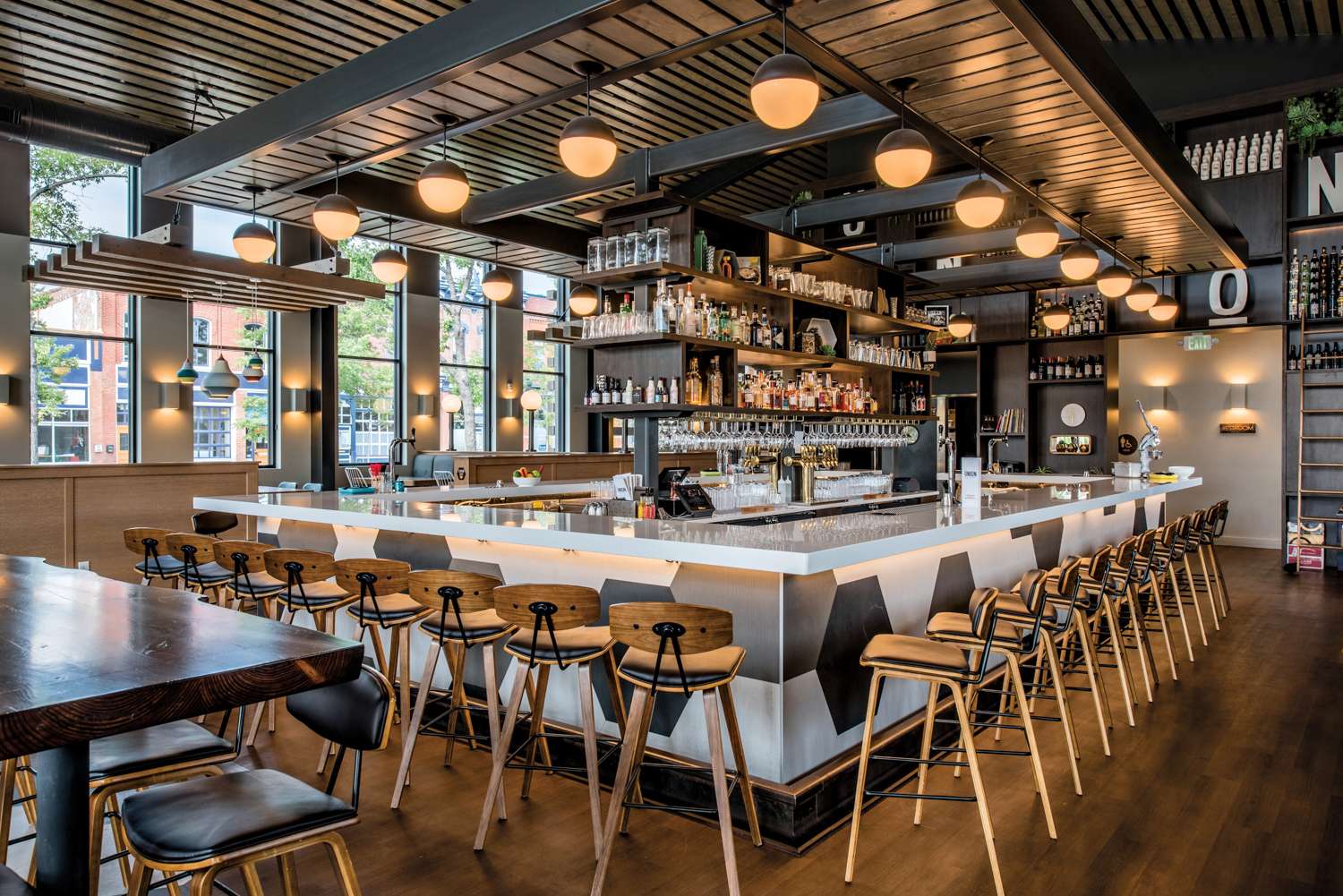 Wooden stools in bar area of Union Bar & Soda Fountain, suggested by Forge & Bow Dwellings