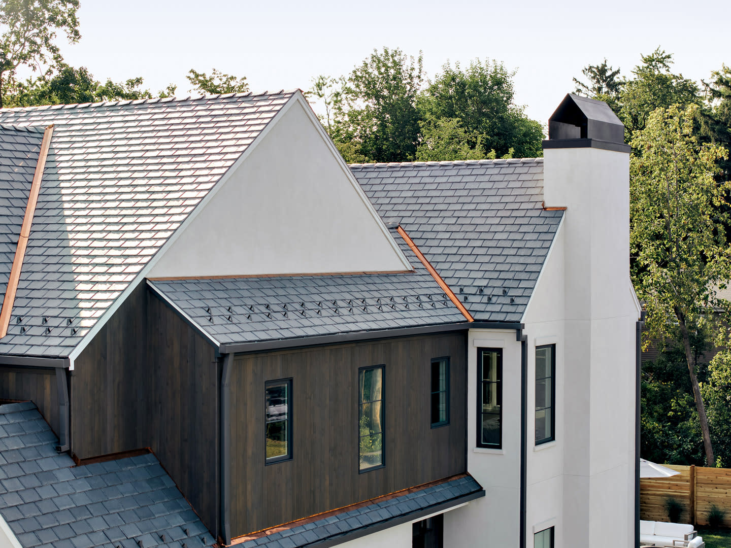 home exterior with a roof made from composite tiles