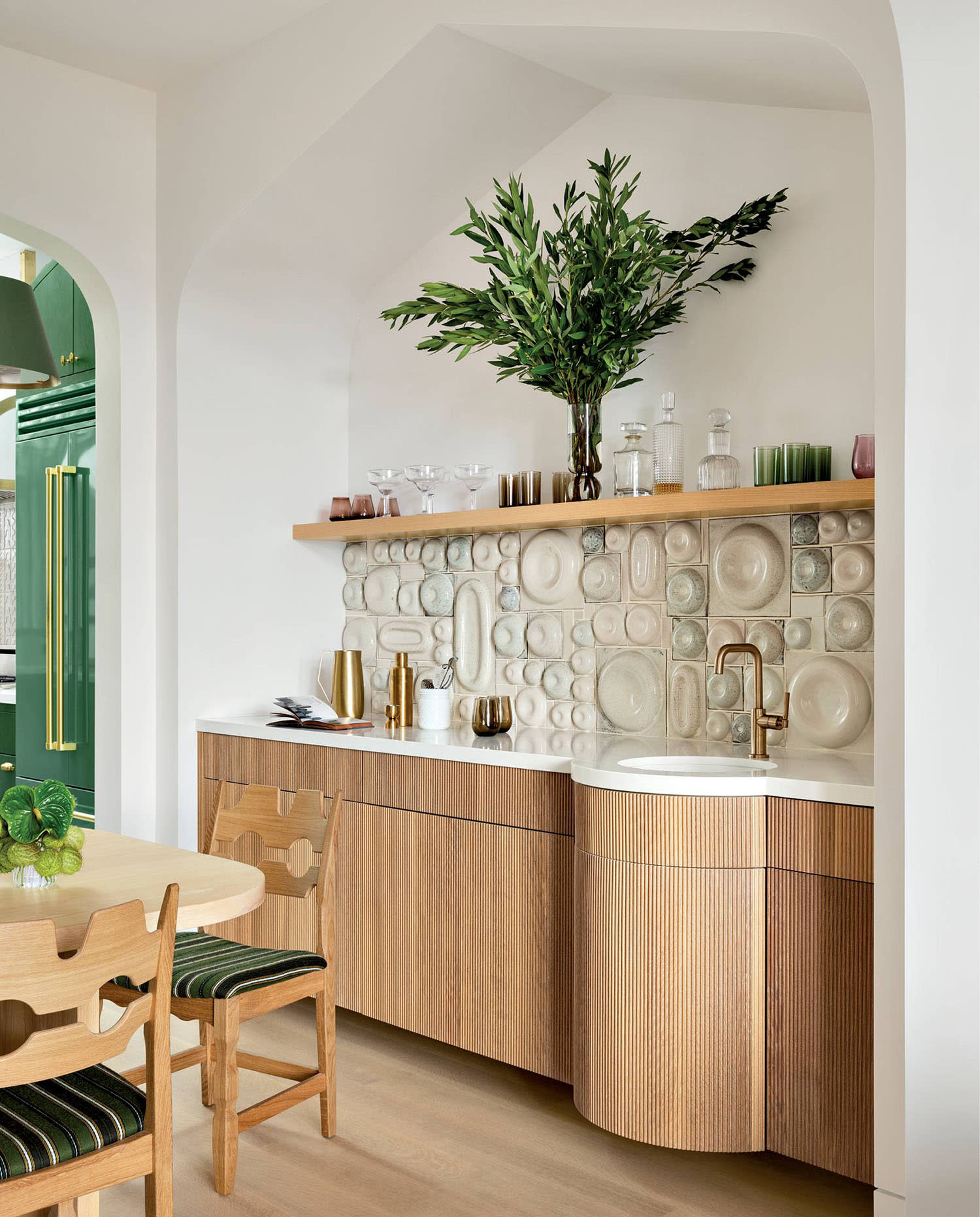 modern home bar with a custom tile backsplash