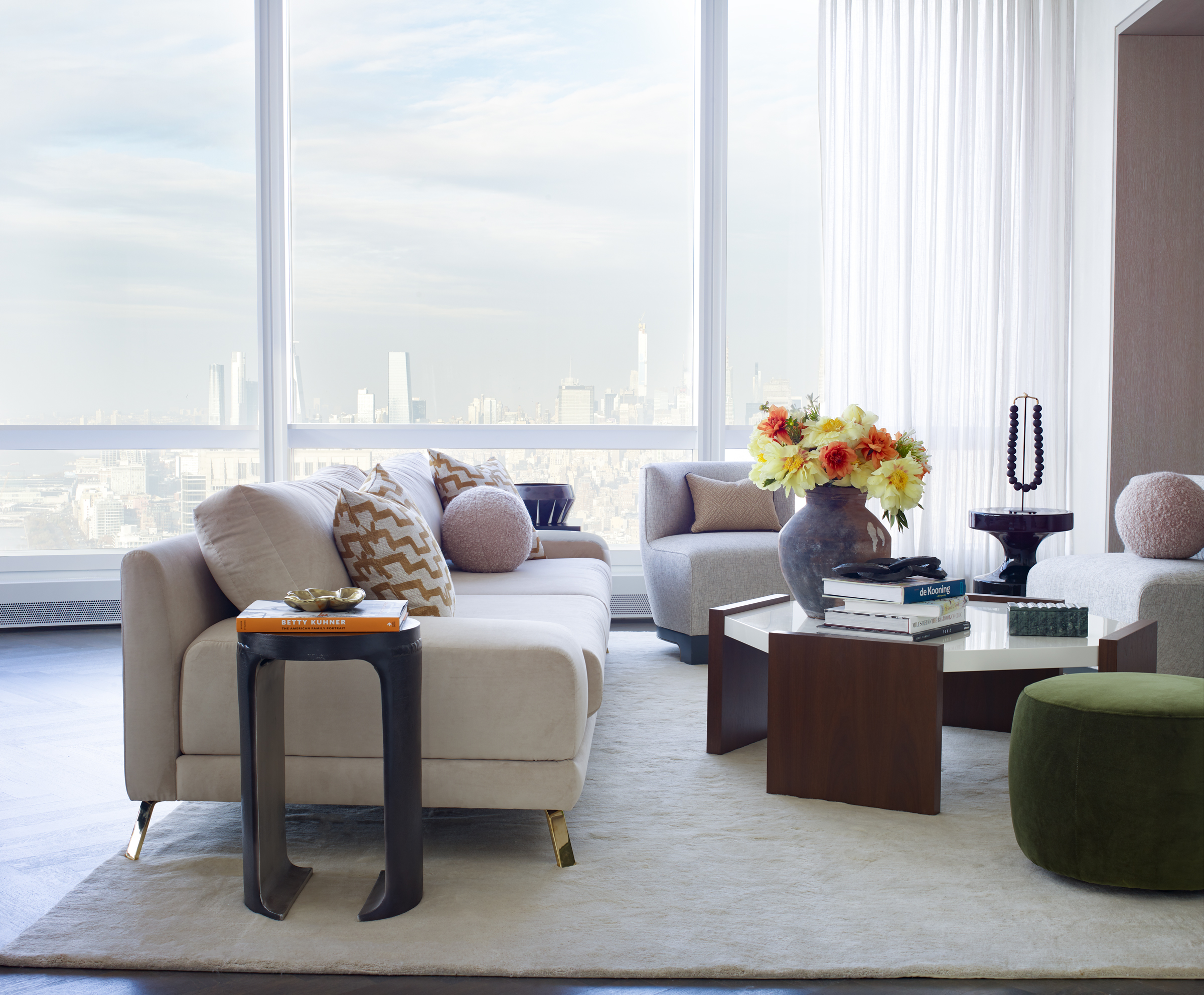 Living room of 111 Murray Street with a city view through the enormous window