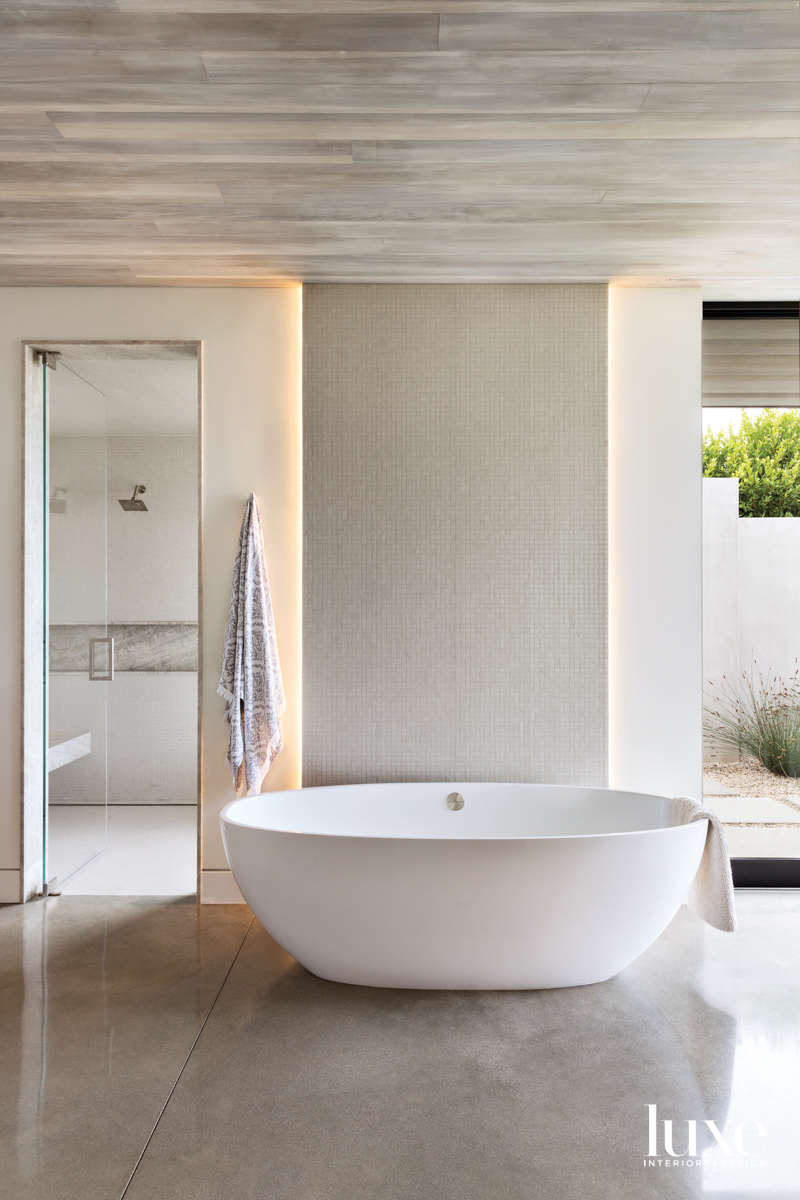 Main bath and tub in wellness room