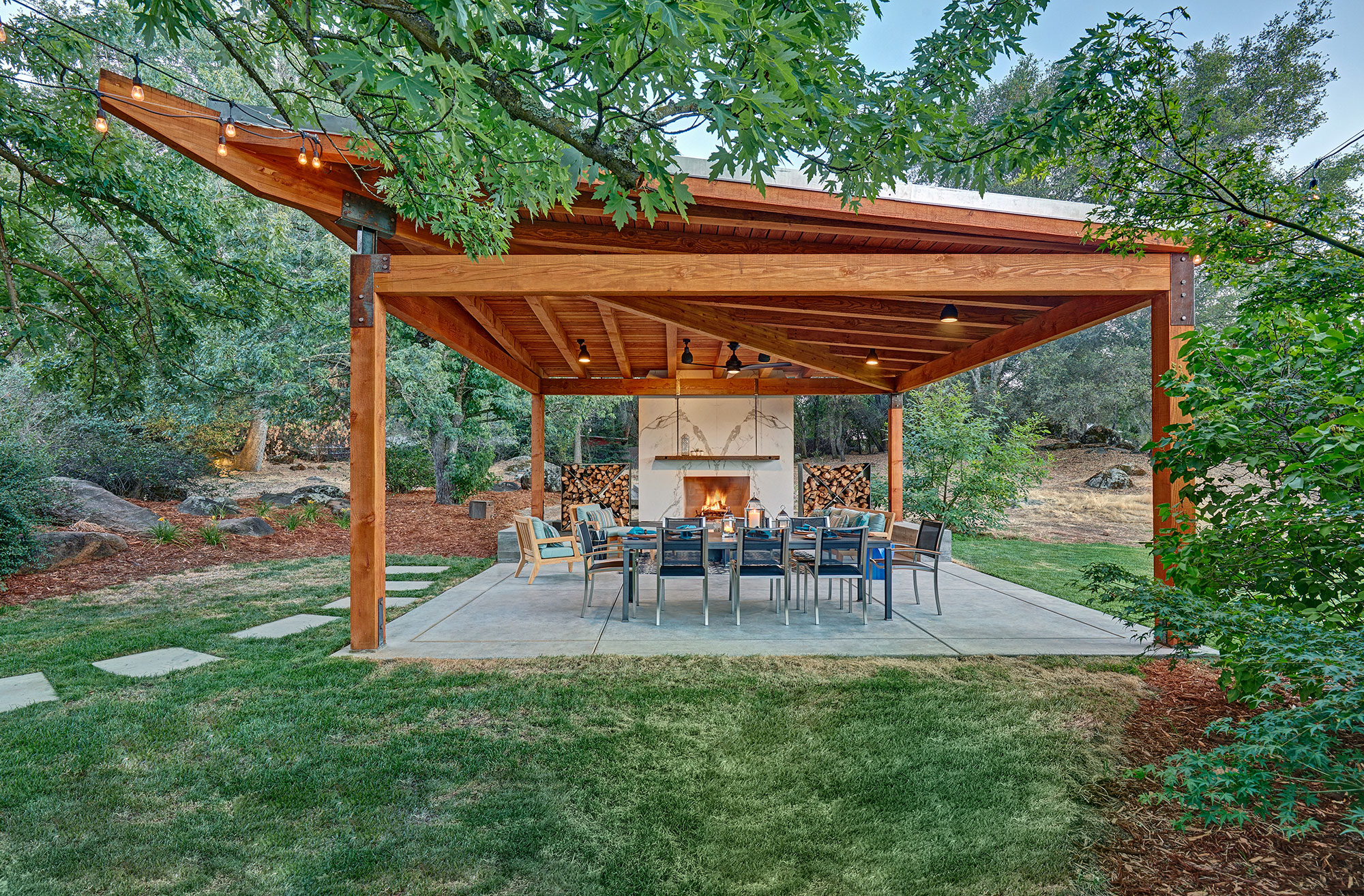 nar bustamante creates an outdoor oasis with dekton cosentino fireplace arbor