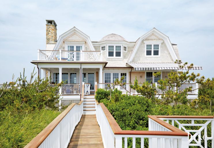 To take advantage of the waterfront location, porches, terraces and paths that lead from the home to the beach were added, and on the bay side is a new pool and pool house. Despite the new elements, though, there was a focus on maintaining the beach cottage theme.