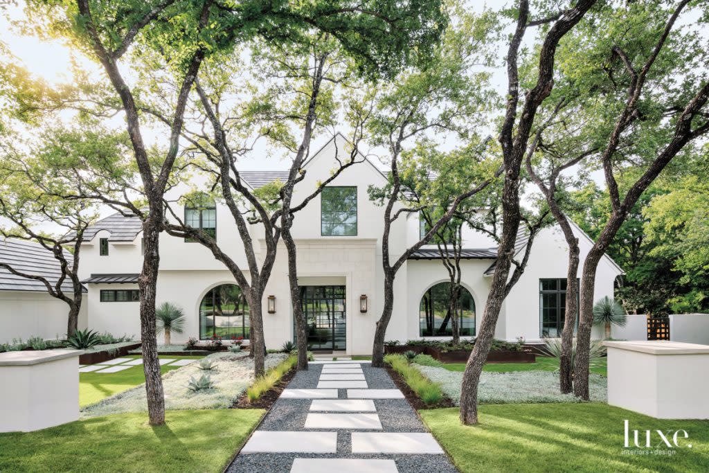 austin home exterior oak trees