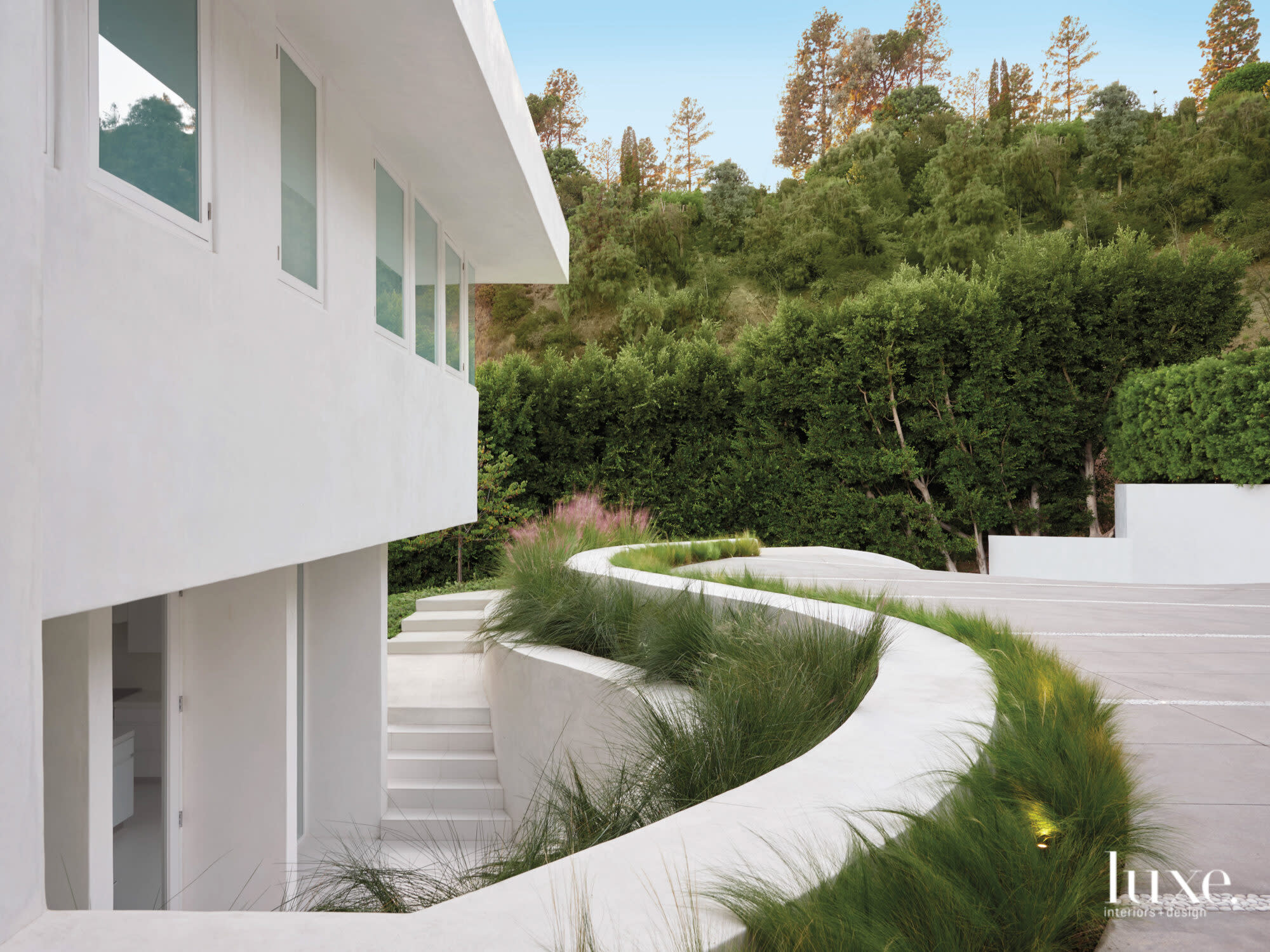 Exterior of modernist house with landscaping