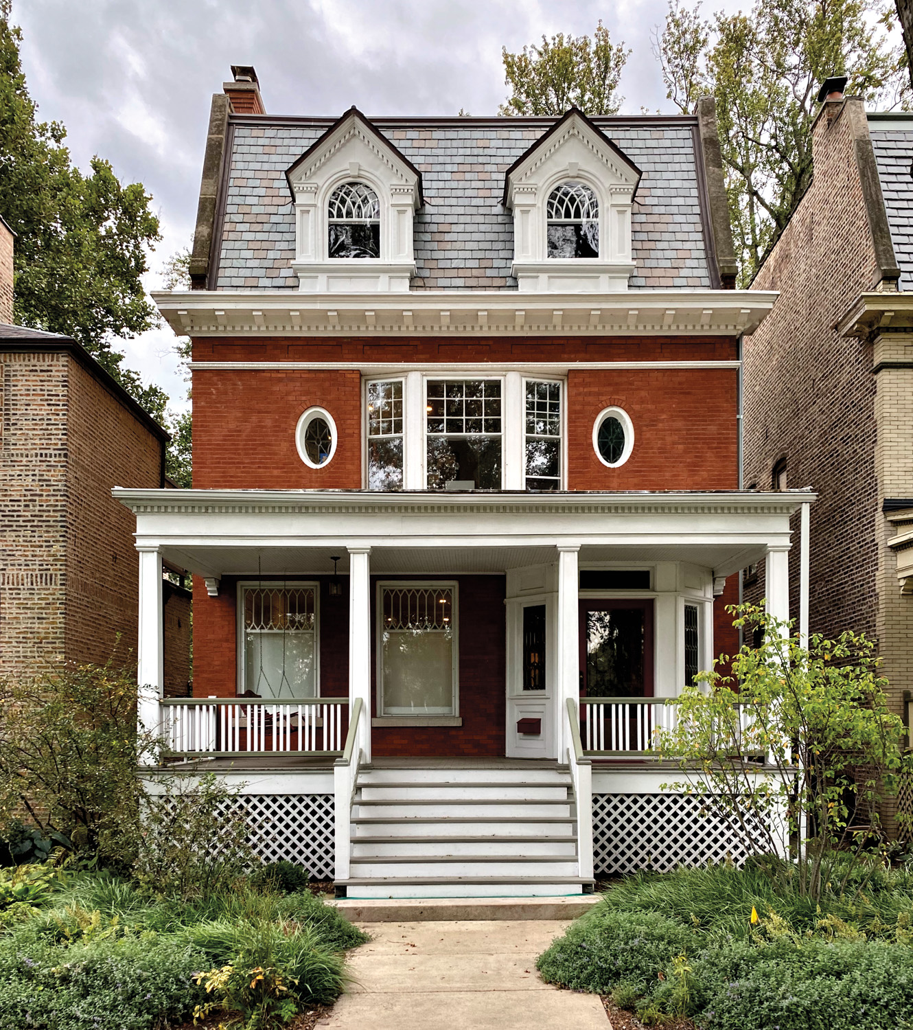 front of brick Chicago two-flat house with front porch