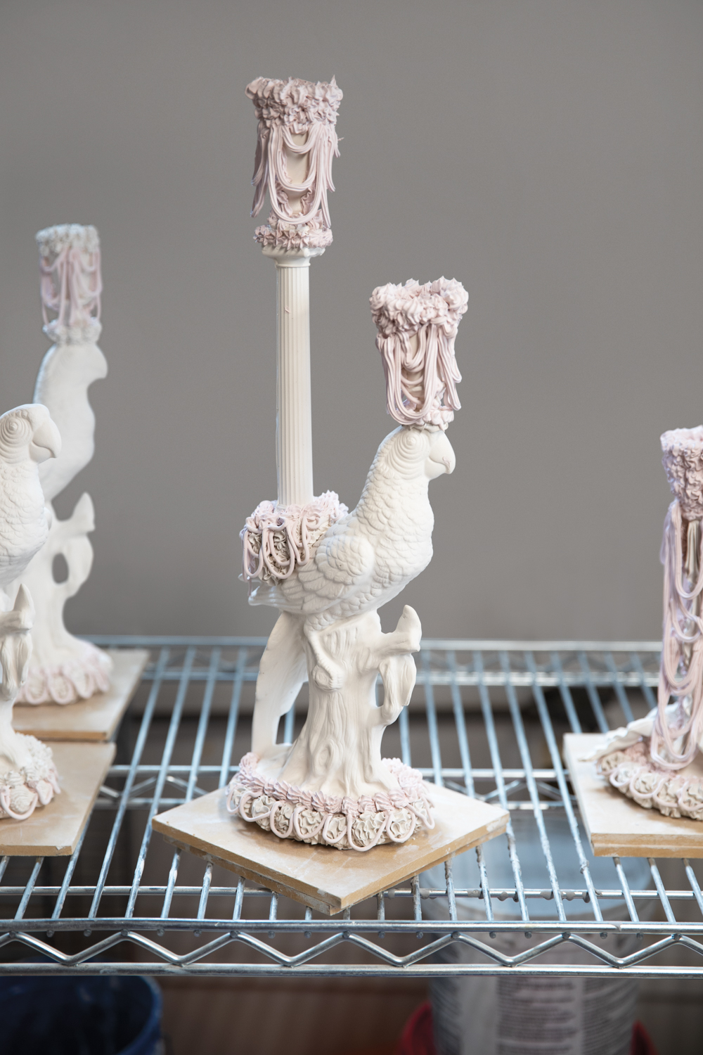 Porcelain parrot candlesticks