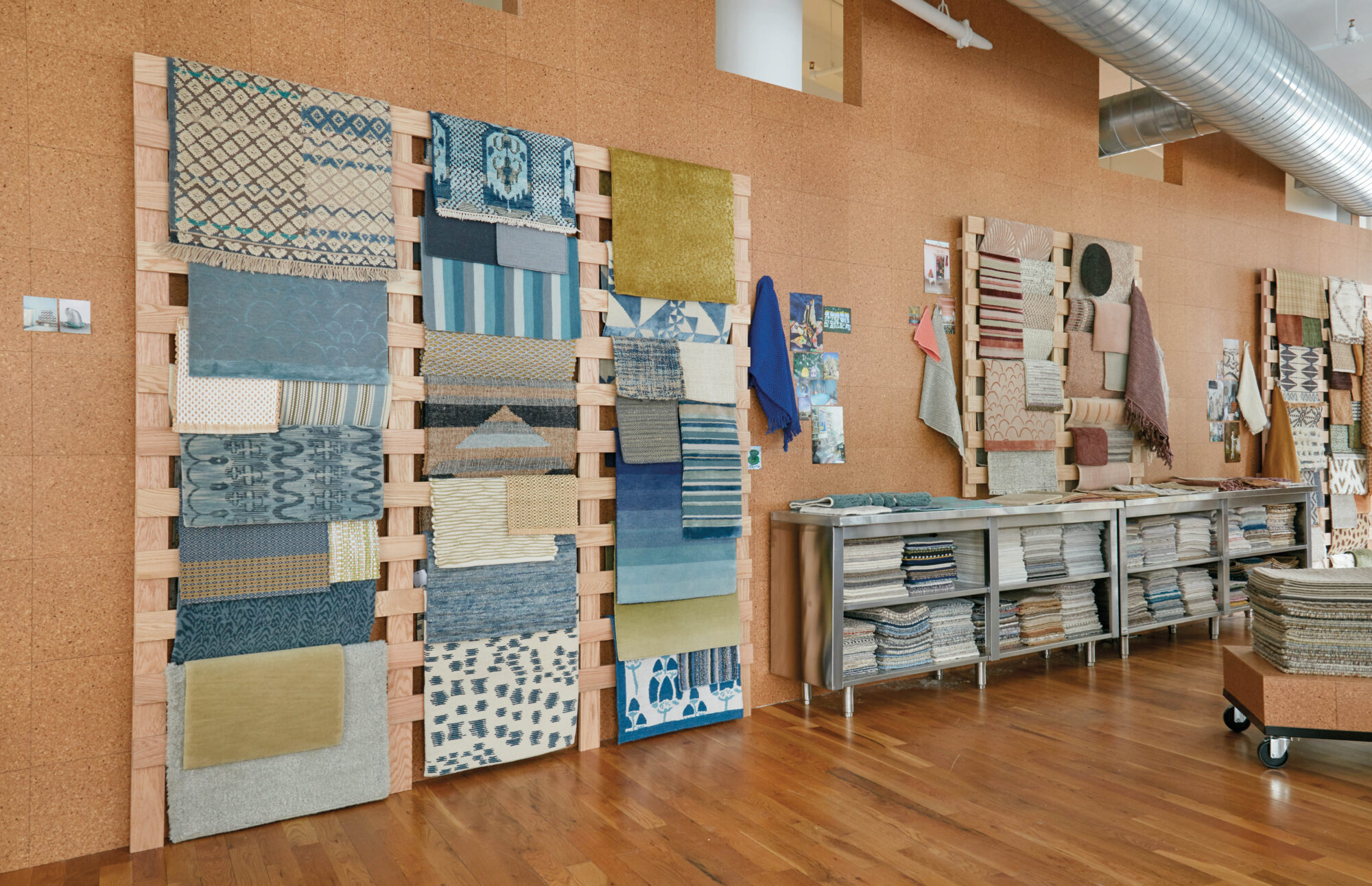 showroom with fabrics on wall