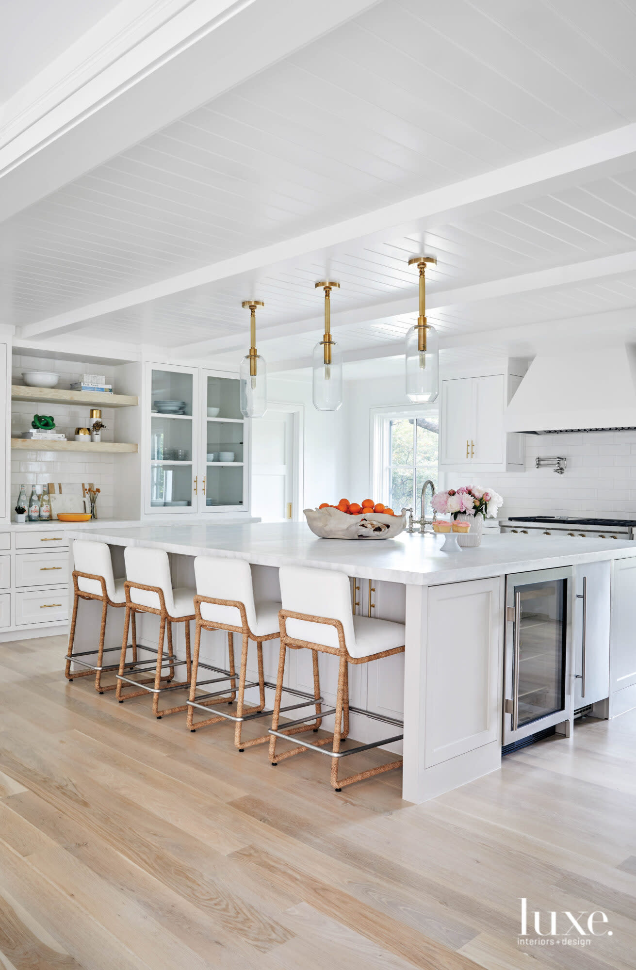 Kitchen with large island and barstools