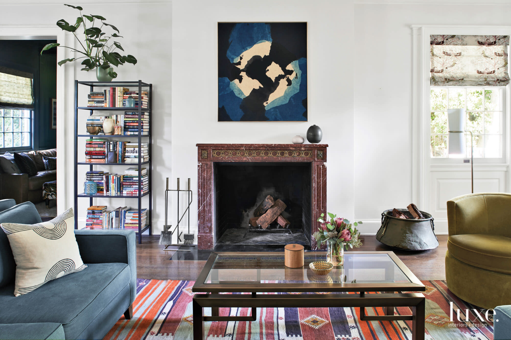 Colorfully decorated living room shot facing fireplace